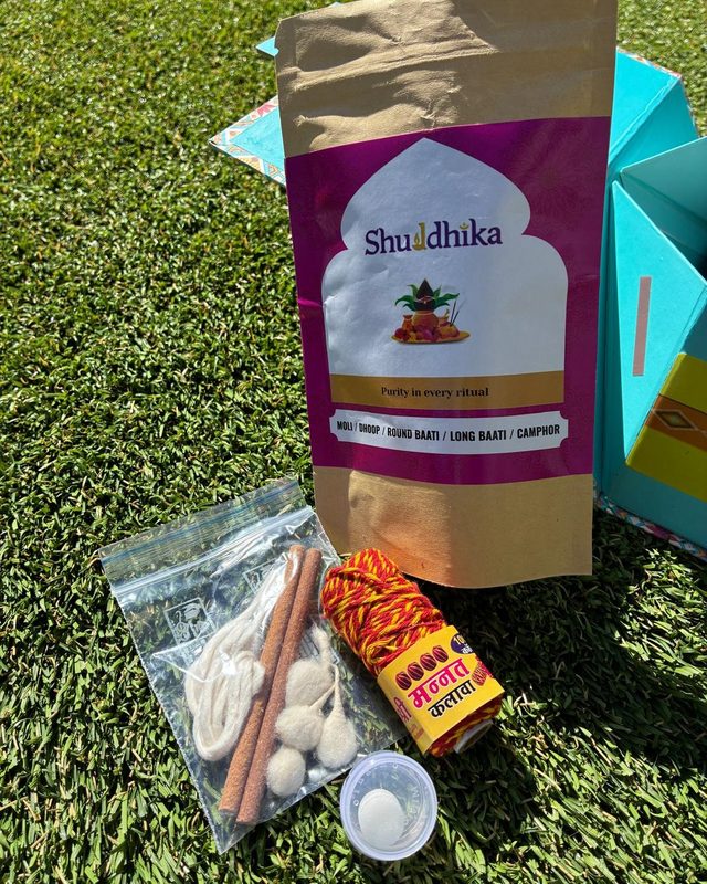Magenta Shuddhika pouch with moli, dhoop, cotton baati and camphor