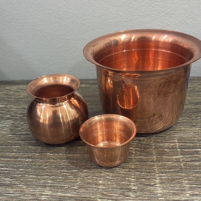 Three copper vessels: a kalash, a bowl and a tumbler